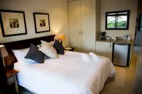 Palmwood Guesthouse - balcón