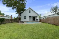 Relaxing Pool and Barbecue Area - Charming Island Oasis