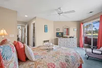 Balconies Overlooking Water and Golf Course - Cozy Beach Haven