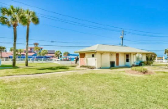 Pool view condo with free WiFi, central ac, private w/d, & shared pool