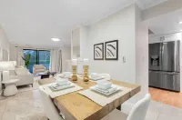 Stylish Townhouse with Patio and Electric Fireplace - Chic Modern Oasis