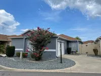 Charming Villa with Screened Lanai and Golf Cart - Cozy Oasis Retreat