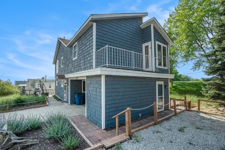 Peek-a-Boo Lake Views and Spacious Deck - Charming Beachside Retreat