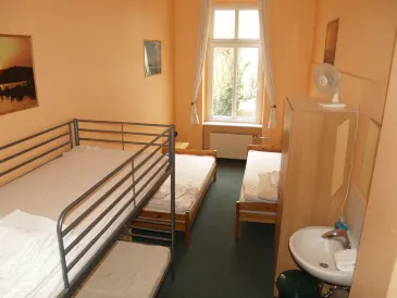 Happy Go Lucky Hotel + Hostel