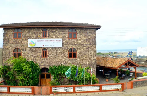 Coconut Grove Bridge House Hotels in Elmina