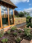 Boutique garden apartment with decking and views