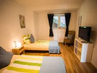 Modern, bright apartment with terrace, directly behind the dike, in the North Sea resort Wremen Hotels in Wremen