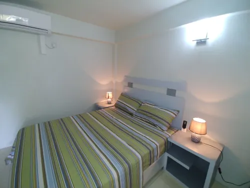 1 Modern A/C apartment with pool. Walking distance from beach, shop & restaurant