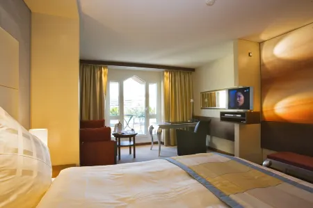 Revier Hotel Säntispark Отели в г. Херизау