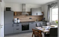 Vacation apartment with heated indoor pool and sauna - Haus Meta Whg. 1 Hotels in Weener