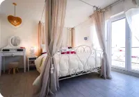 From the apartment and terrace view of the Lake, and with private parking space