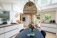 Spacious, luxurious cottage located right on the forest. This is where you come to rest! Hotels in Putten