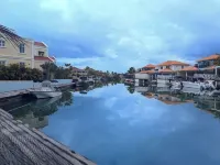 Waterfront 2-BR Oasis with dock – Near Beaches, Stunning Views & Relaxing Vibes!