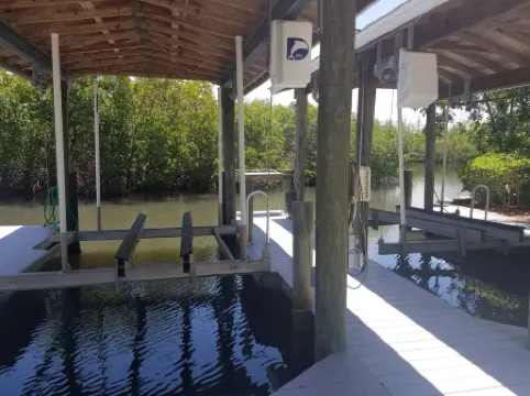 Large home on private penninsula with waterfront and views on three sides.