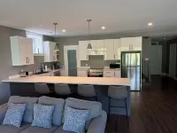 Spacious Walkout Garden-Level Floor W Full Kitchen Hotels in Bedford