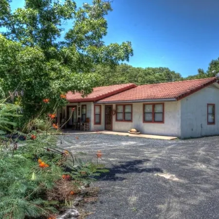 4-bedroom house in Utopia with 450’ of private crystal clear Sabinal river front