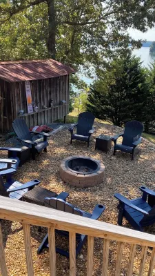 Scenic lake house with private covered dual-slip and two covered lake-view decks