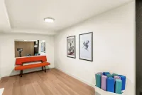 Modern Retreat w/ Hot Tub, Peloton, Gym, and BBQ