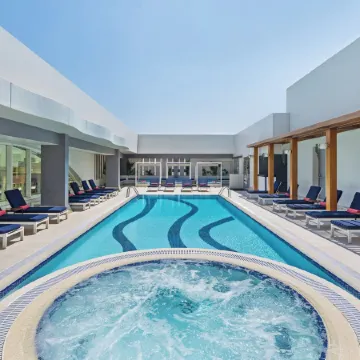Al Maha Arjaan by Rotana Отели рядом с достопримечательностью «Торговый центр Liwa Centre»