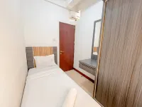 Simple 2BR Apartment at Tamansari Panoramic By Travelio