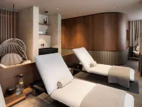 Andermatt Alpine Apartments Hotele w: Andermatt