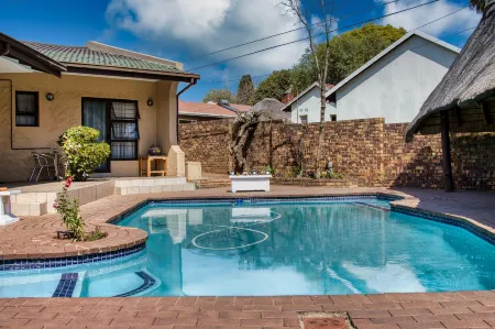 Woodpecker's Inn Guest House Отели в г. Кемптон Парк