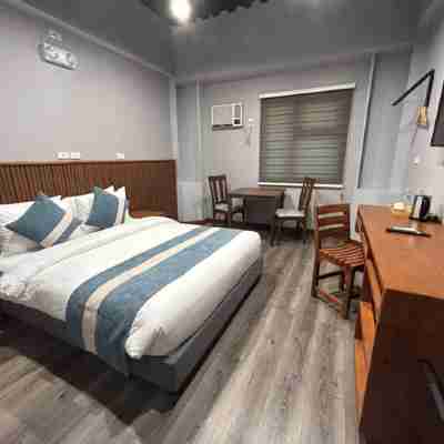 Kekehyu Business Hotel Rooms