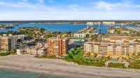 Exclusive PENTHOUSE Footsteps from Madeira Beach! 3BR/3BA with a Heated Pool!