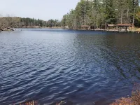 Cabin on the Eagle River Chain! Boat dock slip! Kayaks! Firewood for bonfires! Hotels in Lincoln