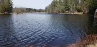 Cabin on the Eagle River Chain! Boat dock slip! Kayaks! Firewood for bonfires!
