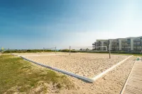 Just steps away - beach, pool, & attractions on the Emerald Isle! New Home.