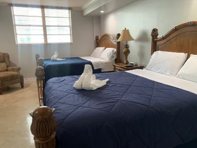 Entire condominium with a pool view, steps from the beach