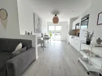 Close to the city center, with balcony, parking space and charging station