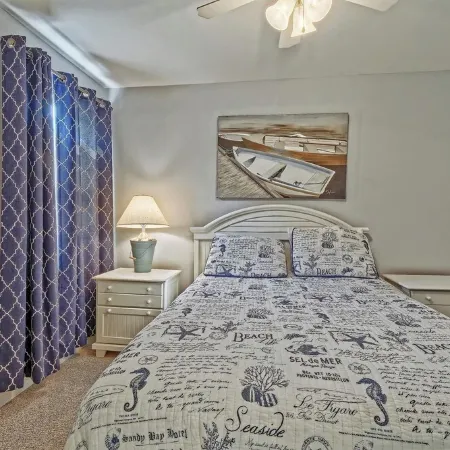 Bright and Airy Condo.  One block to the Beach.  Great location.