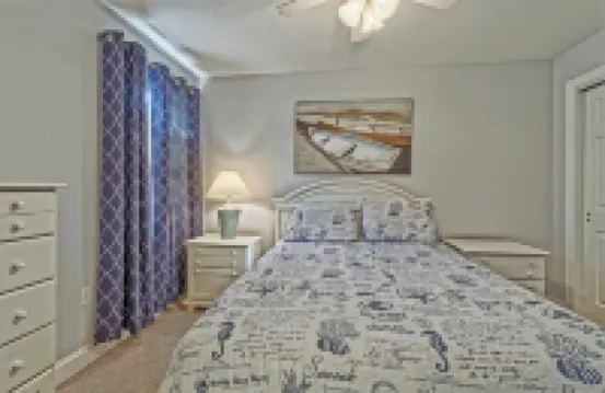 Bright and Airy Condo.  One block to the Beach.  Great location.