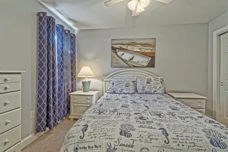 Bright and Airy Condo.  One block to the Beach.  Great location.