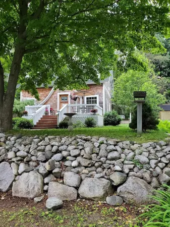 The Boathouse on Waukazoo!  Beach, Bars, Brewery all within a block!