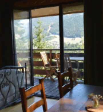 Adorable chalet perched in the forest with breathtaking views of the ski area.