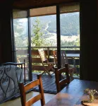 Adorable chalet perched in the forest with breathtaking views of the ski area.