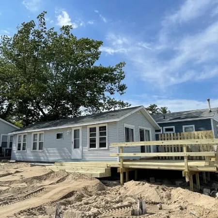 Three bedrooms with kitchen and a huge deck.