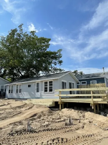 Three bedrooms with kitchen and a huge deck.