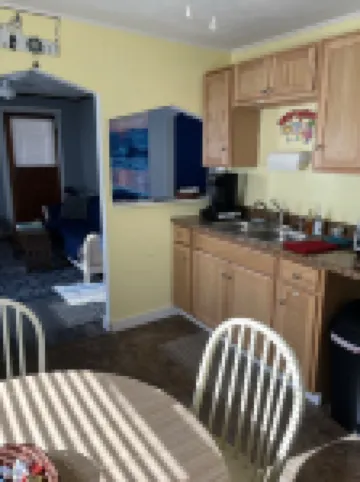 Cute, clean, cozy and pet friendly cottage that is 10 minute walk to the strip.