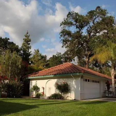 Center model of lux triplex with kaweah river running by property.