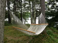 QUINTESSENTIAL MAINE LOG CABIN SET ON GORGEOUS LAKE