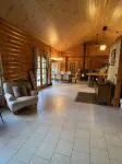 Gorgeous 4Br Log Retreat on 40 Acres —Pond View – Mid-Michigan—sleeps 11+