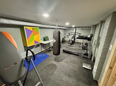 Spacious 7-bedroom house with WiFi, Garage, Sauna, and AC in amazing Calumet