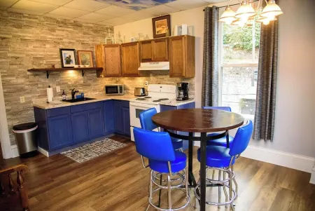 Upscale King Suite with Purple Mattress and reserved off-street parking