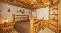Sojourner's Lodge & Log Cabin Suites - Balkon