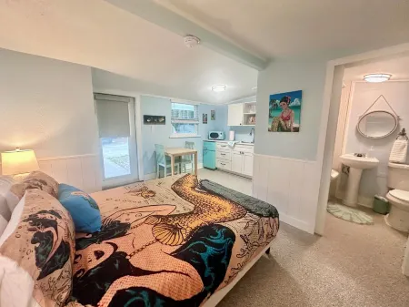 Neptune's Grotto Waterfront Retreat Отели в г. Уики Уэши