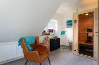 A treasure chest behind the dike at the harbor for two people